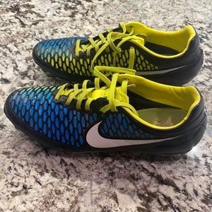 Blue/yellow Nike soccer cleats